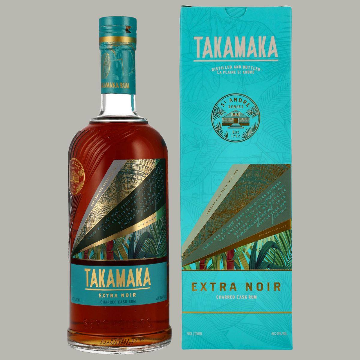 Takamaka Extra Noir Charred Cask Rum, 70cl, von den Seychellen. Dunkler Rum, Column-Still destilliert, 43 % Vol., Flasche mit geprägtem Design und gold-blauem Etikett, türkisfarbene Geschenkverpackung mit tropischen Motiven.